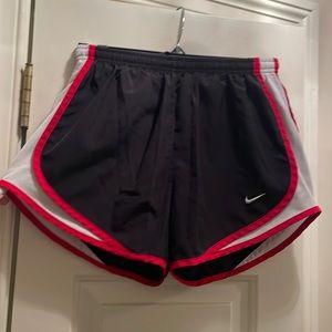 Women’s black Nike Dri-Fit shorts with red and white trim, size small